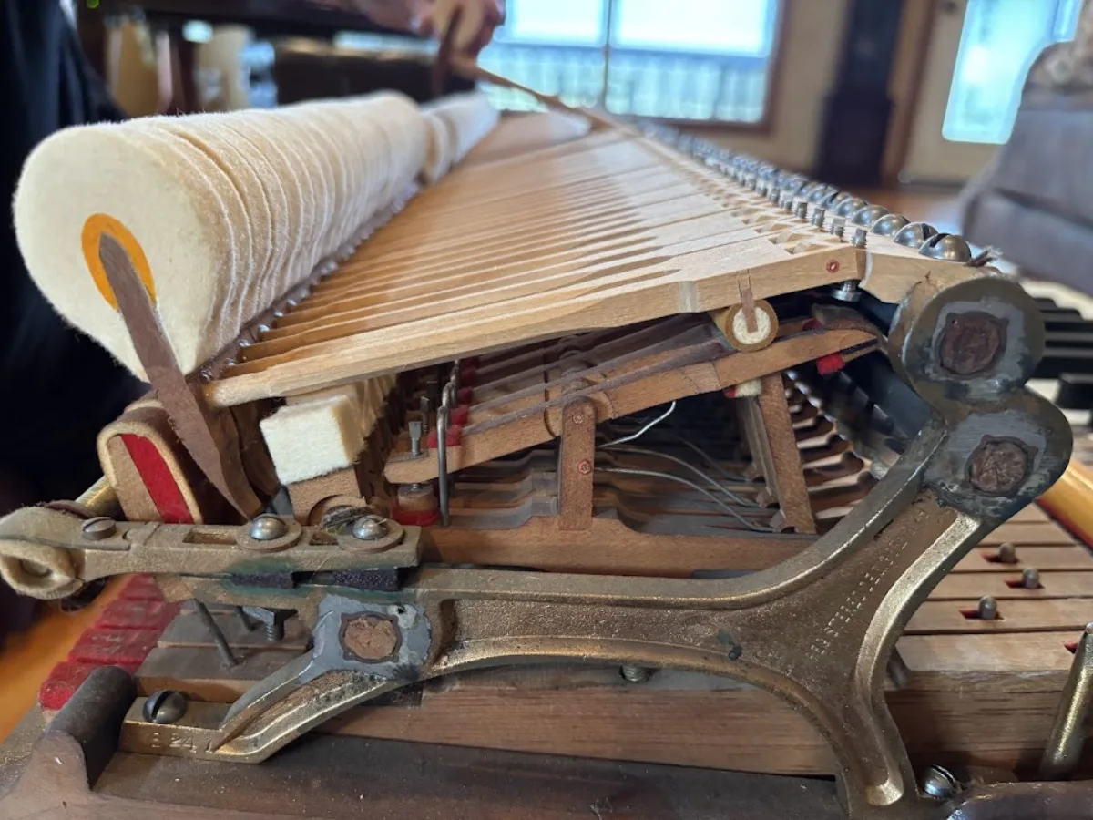 Grand piano action mechanism side view