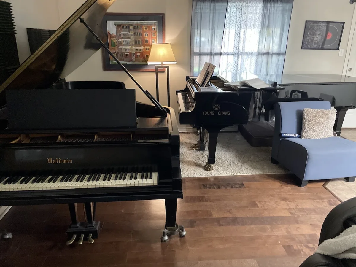 Baldwin and Young Chang grand pianos in a home